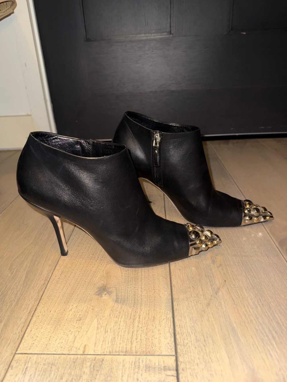 Louis Vuitton Black Leather Ankle Booties with Gold Studded Cap Toe